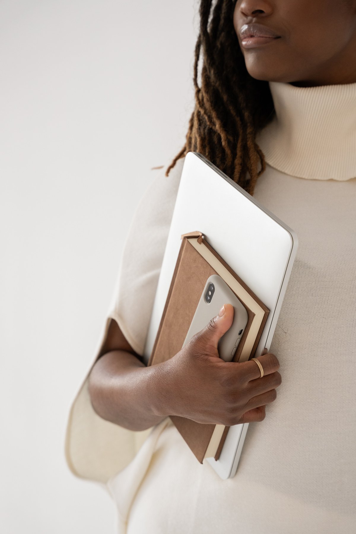 Elegant Office Business Woman Holding Work Supplies